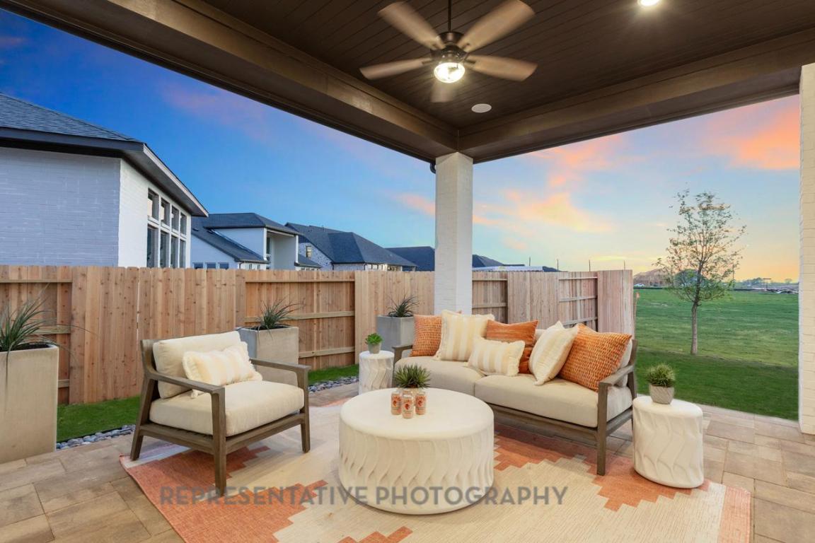 205 Leaning Rock Ridge Austin, TX 78737 - Photo 21 of 40 a outdoor living space with patio furniture and garden view