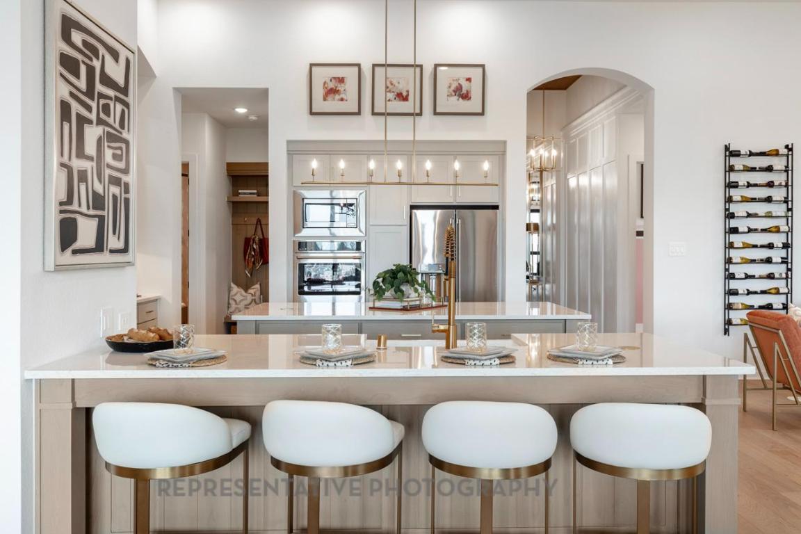 205 Leaning Rock Ridge Austin, TX 78737 - Photo 30 of 40 a bathroom with a sink and a mirror