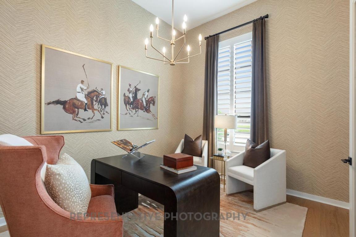 205 Leaning Rock Ridge Austin, TX 78737 - Photo 36 of 40 a living room with furniture a table and a chandelier