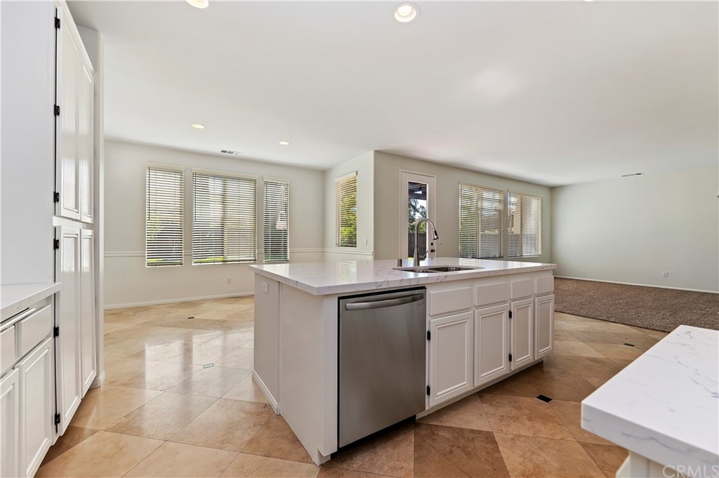 13527 Jasper Loop Eastvale, CA 92880 - Photo 13 of 37 a large bathroom with a large tub and sink