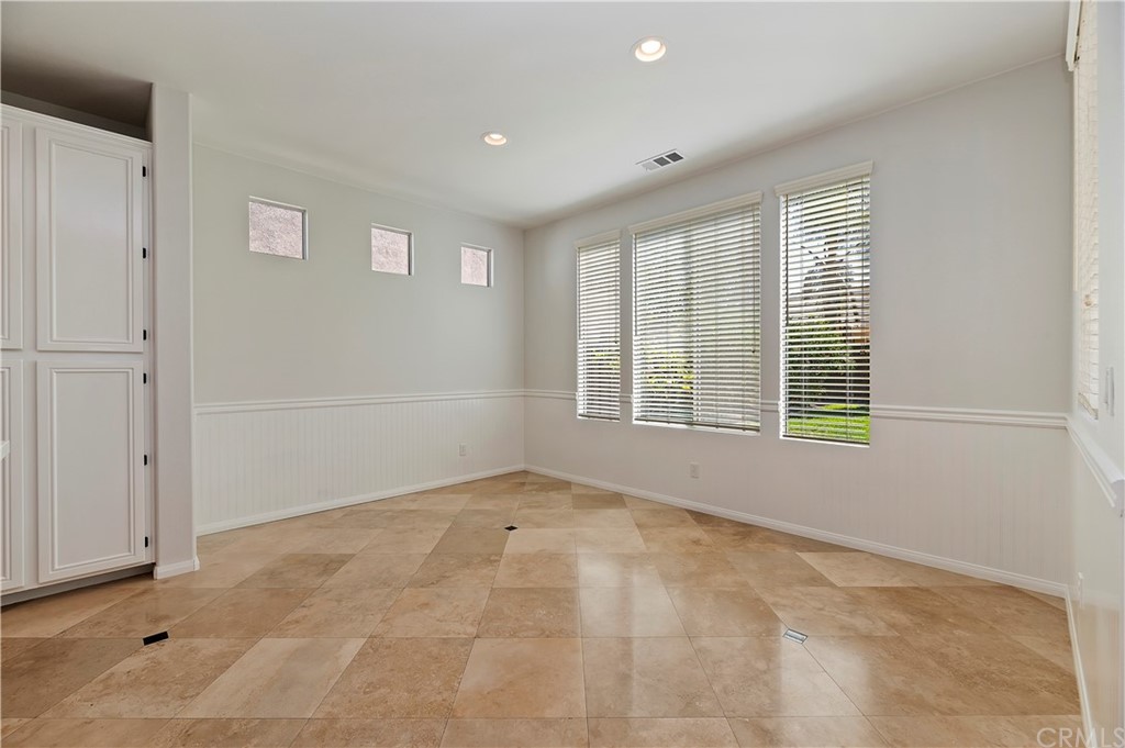 13527 Jasper Loop Eastvale, CA 92880 - Photo 15 of 37 a view of an empty room with a window
