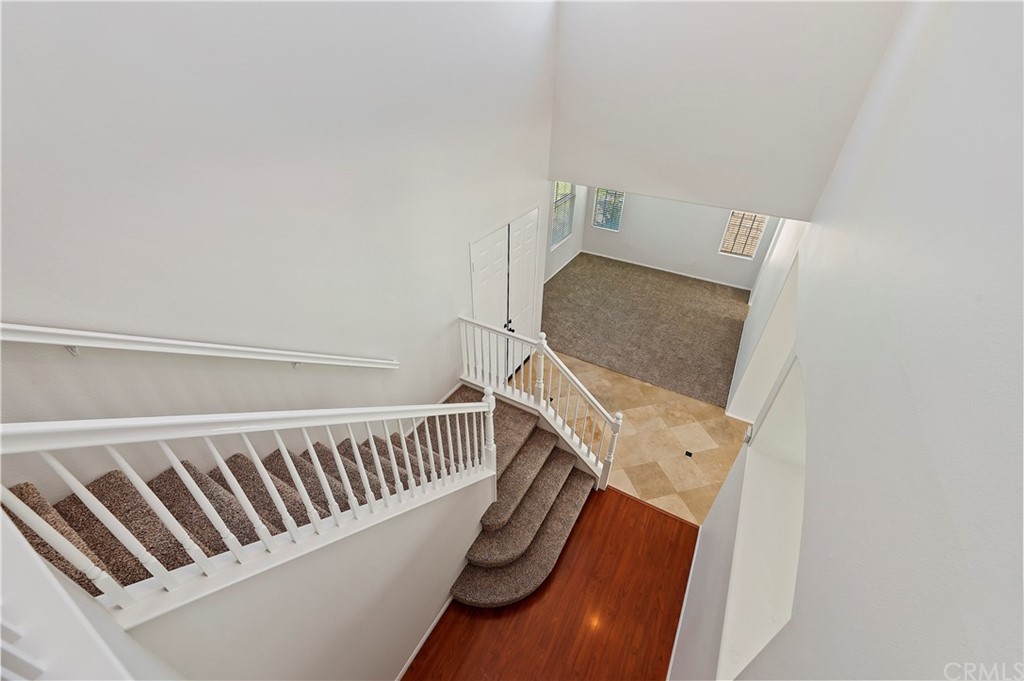 13527 Jasper Loop Eastvale, CA 92880 - Photo 22 of 37 a view of a room with racks on the wall
