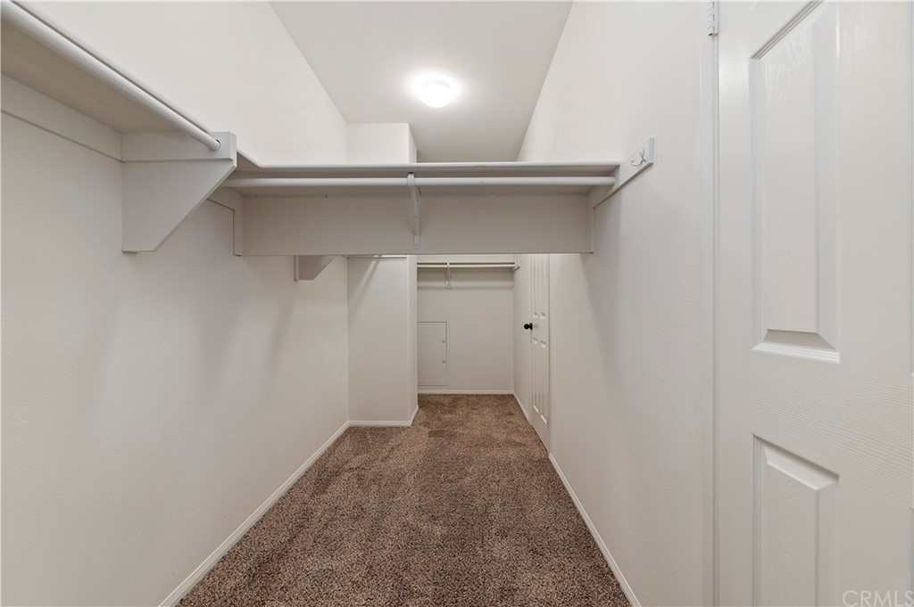 13527 Jasper Loop Eastvale, CA 92880 - Photo 27 of 37 a view of a hallway