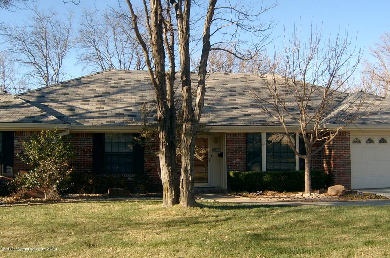 6903 Calumet Road Amarillo, TX 79106 - Photo 1 of 34 a view of a house with a yard