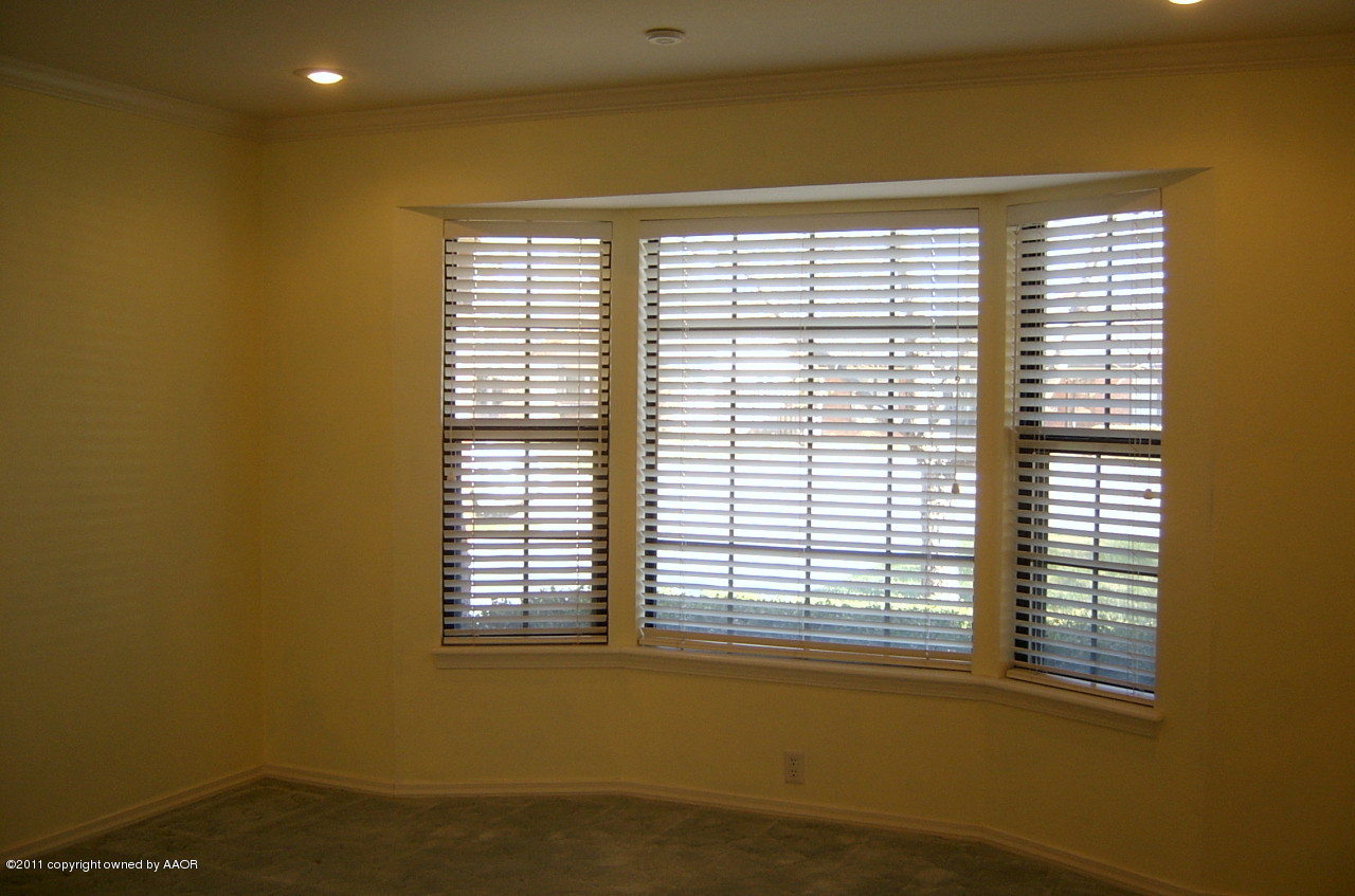 6903 Calumet Road Amarillo, TX 79106 - Photo 13 of 34 a view of a room with a large window