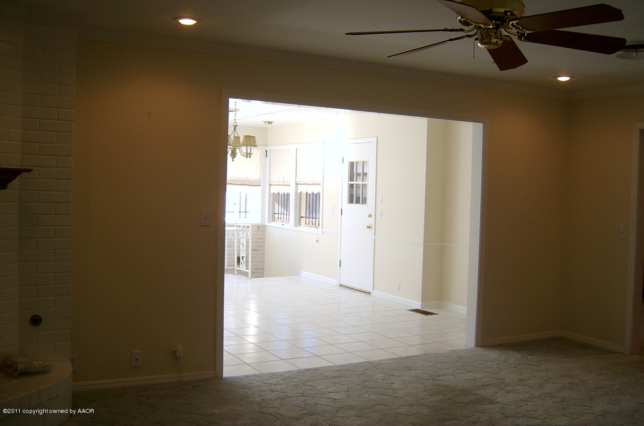 6903 Calumet Road Amarillo, TX 79106 - Photo 15 of 34 a view of an empty room with a window