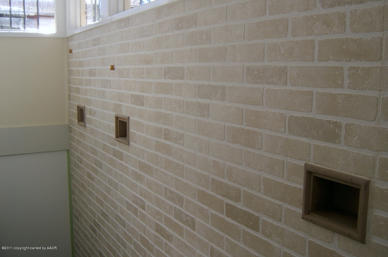 6903 Calumet Road Amarillo, TX 79106 - Photo 17 of 34 a bathroom with a shower