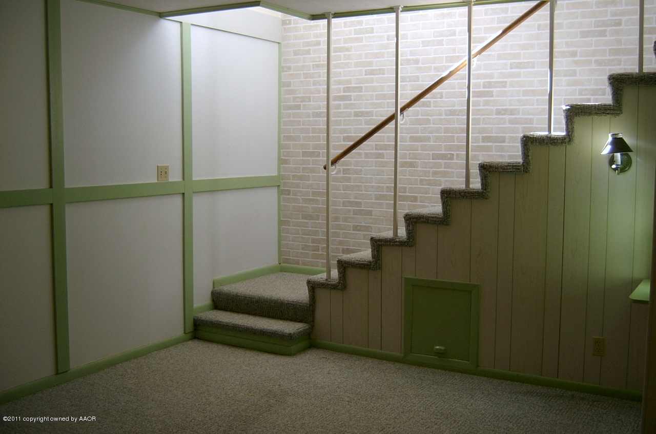 6903 Calumet Road Amarillo, TX 79106 - Photo 18 of 34 a view of entryway with stairs