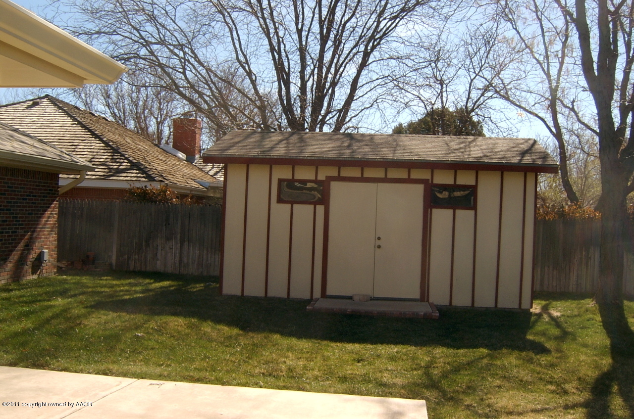 6903 Calumet Road Amarillo, TX 79106 - Photo 34 of 34 a view of a house with a yard