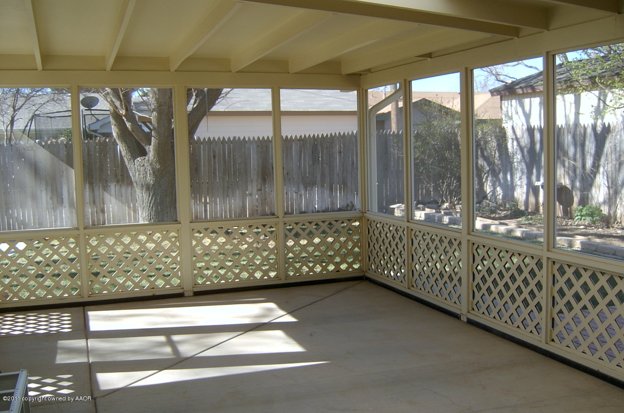 6903 Calumet Road Amarillo, TX 79106 - Photo 5 of 34 a view of outdoor space with sliding door