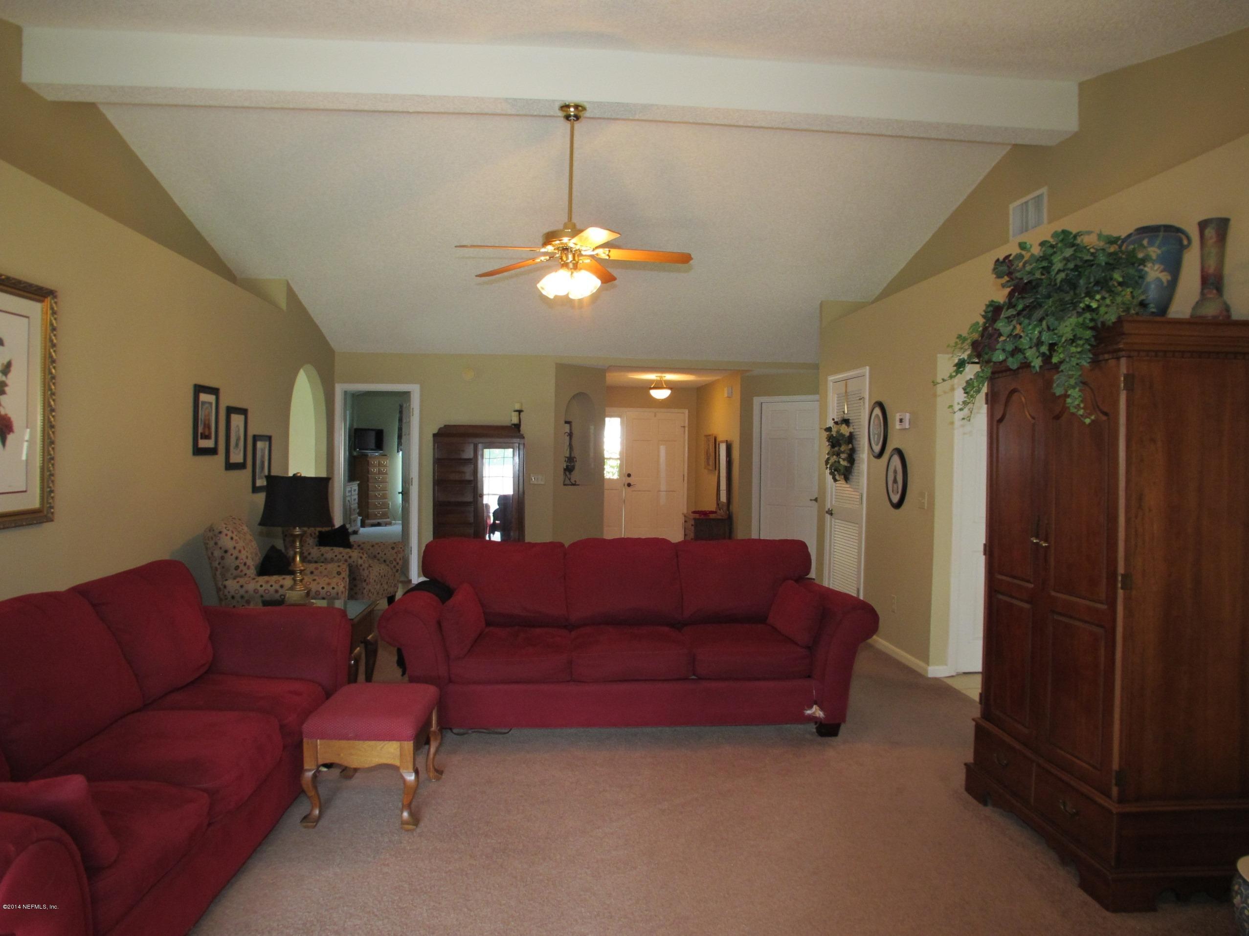 1519 Marsh Rabbit Way Fleming Island, FL 32003 - Photo 6 of 21 Living Room View 3