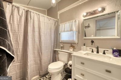 39 Shady Crk Ridge Marble, NC 28905 - Photo 19 of 64 a bathroom with a sink toilet and shower