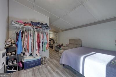 39 Shady Crk Ridge Marble, NC 28905 - Photo 21 of 64 a bed room with a bed and a couch