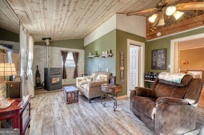 39 Shady Crk Ridge Marble, NC 28905 - Photo 3 of 64 a living room with furniture and a wooden floor