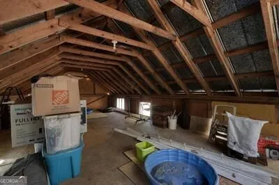 a view of a backyard of the house