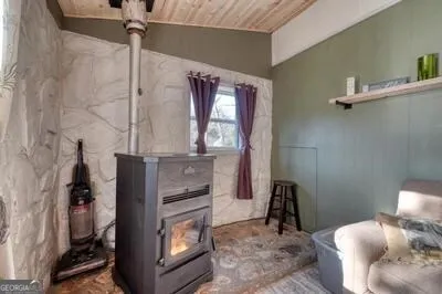 a living room with lots of furniture and a chandelier