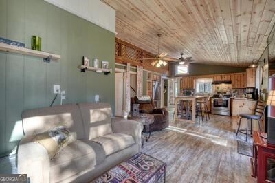 39 Shady Crk Ridge Marble, NC 28905 - Photo 5 of 64 a living room with furniture and a chandelier