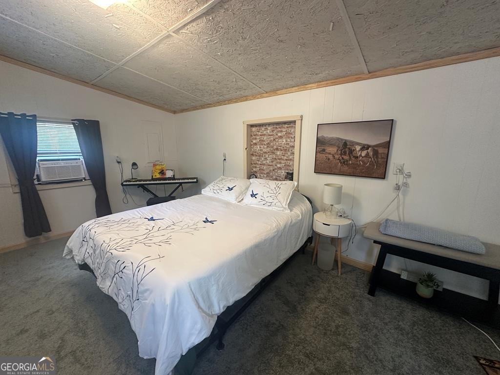 39 Shady Crk Ridge Marble, NC 28905 - Photo 57 of 64 a bed room with a bed and a desk