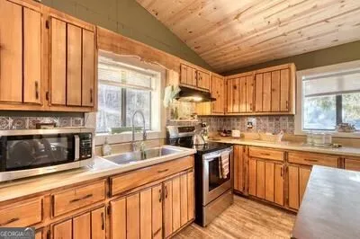 a view of a dining room with furniture
