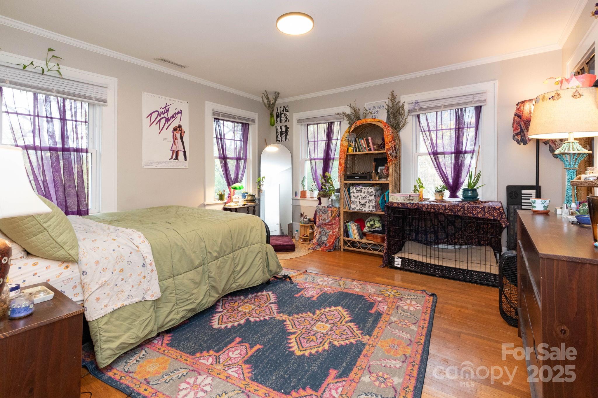 16 Gracelyn Road Asheville, NC 28804 - Photo 17 of 22 a bedroom with a bed and window