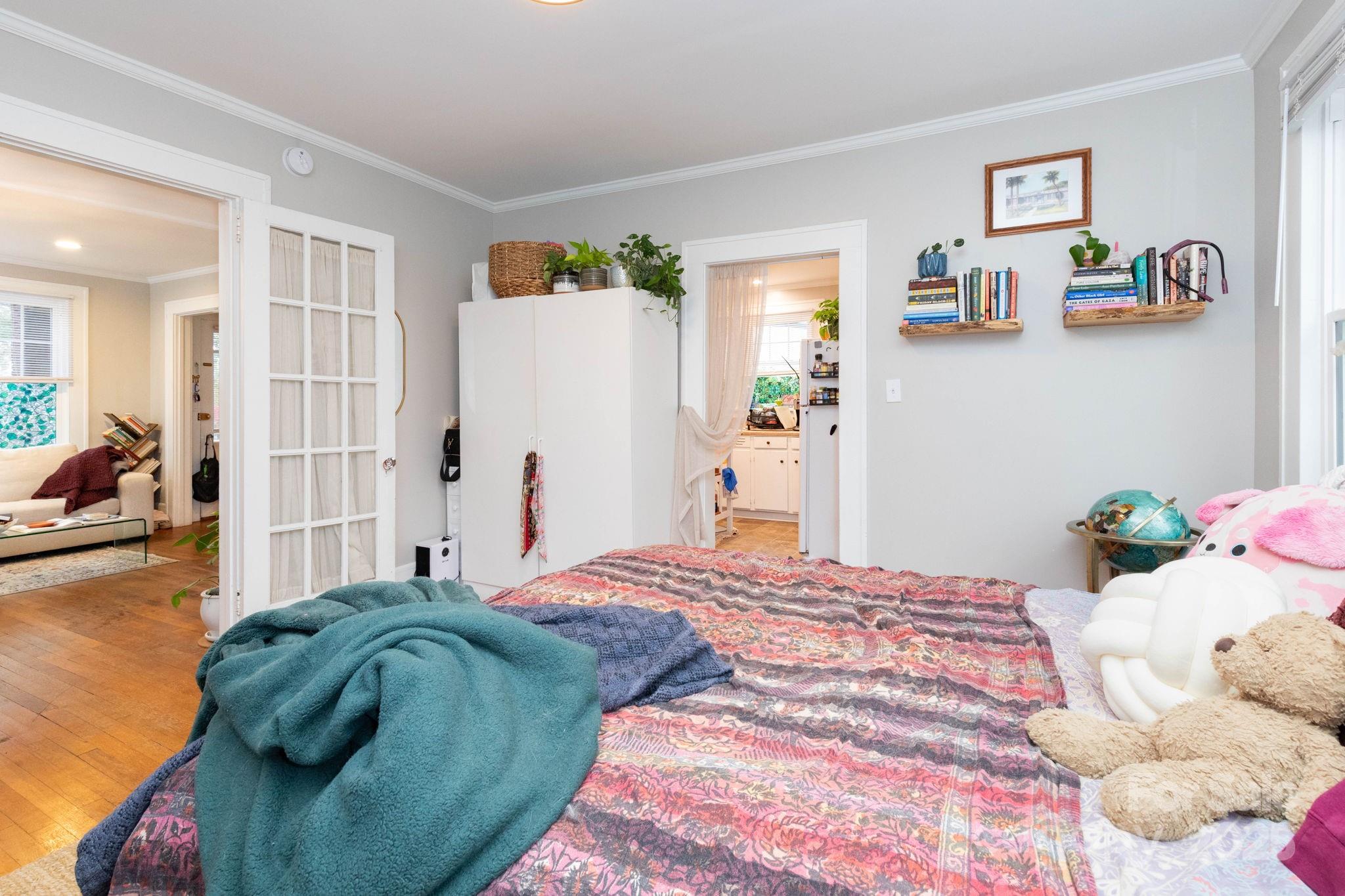 16 Gracelyn Road Asheville, NC 28804 - Photo 9 of 22 a bedroom with a bed and wooden floor