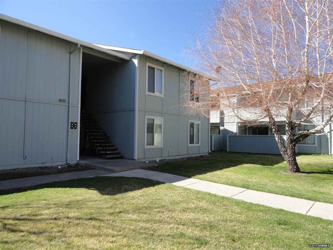 400 South Saliman Road, Unit 19 Carson City, NV 89701 - Photo 1 of 1 a view of a house with a yard