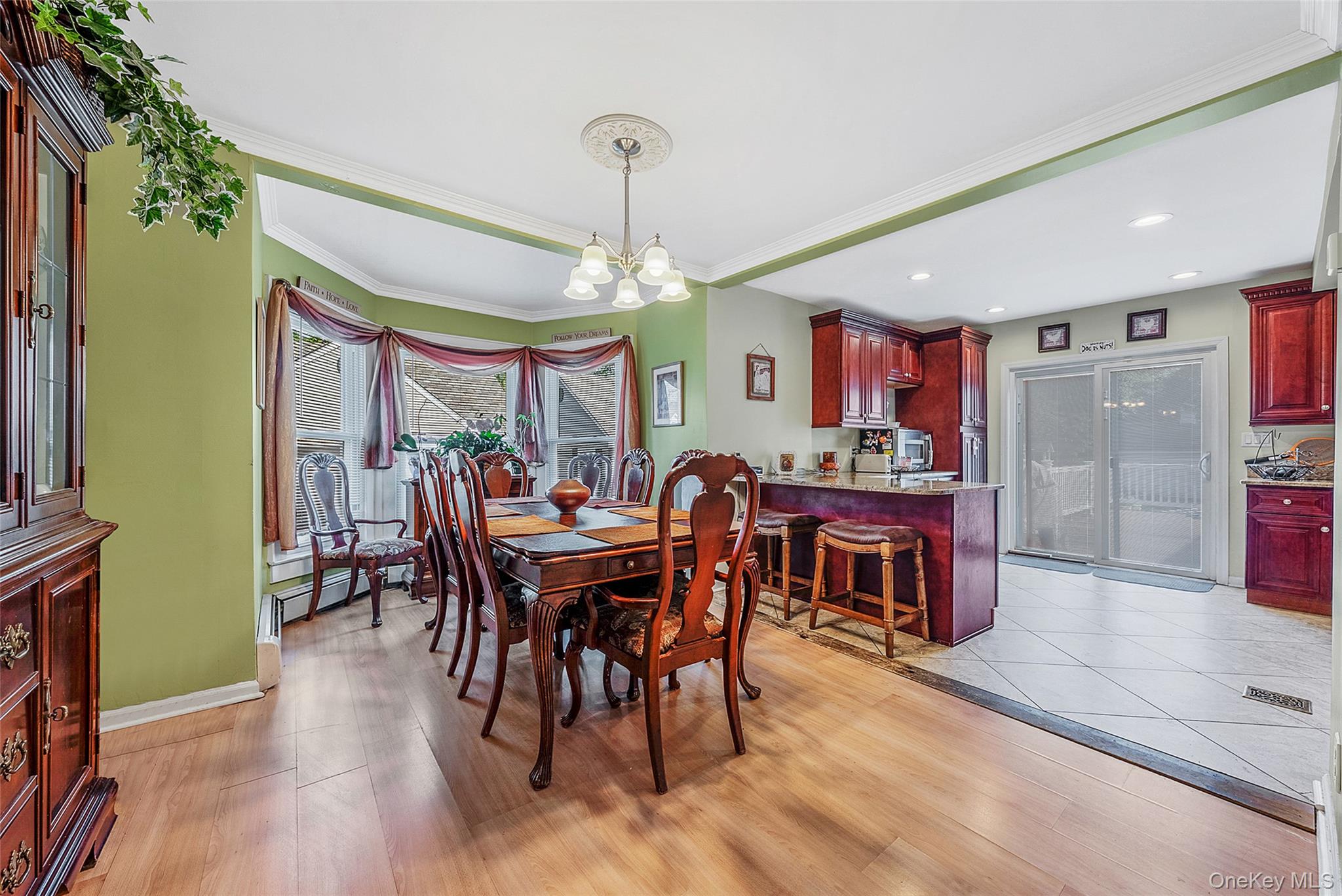 80 George Street Babylon, NY 11702 - Photo 10 of 41 a view of a dining room with furniture window and wooden floor