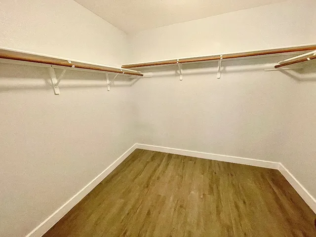 a view of a room with racks on the wall