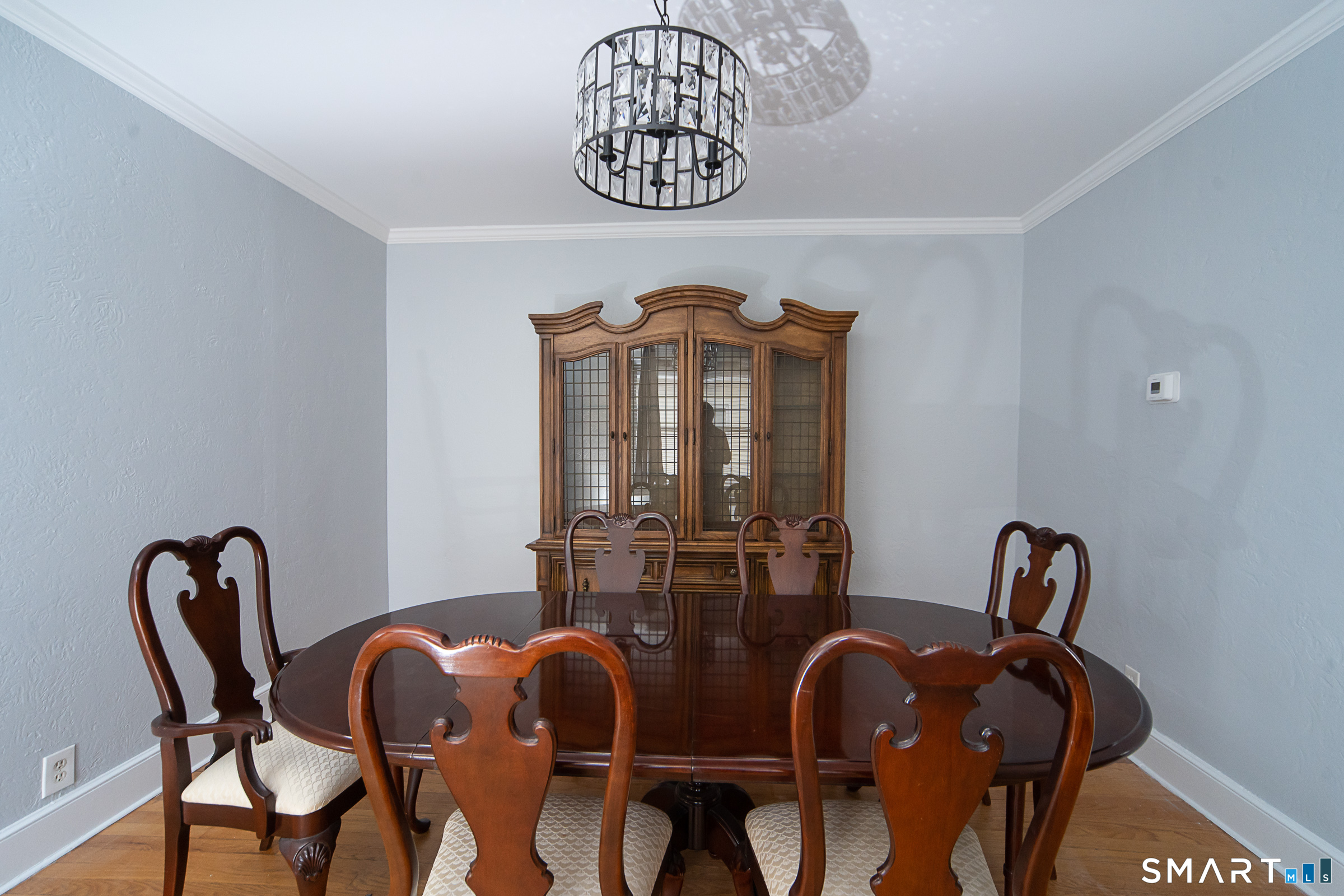 13 Rutland Street Ansonia, CT 06401 - Photo 1 of 1 a view of a dining room with furniture and chandelier