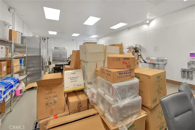 a bathroom with a toilet a sink and a mirror