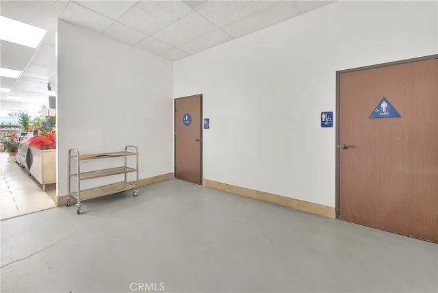 a bathroom with a sink toilet and mirror