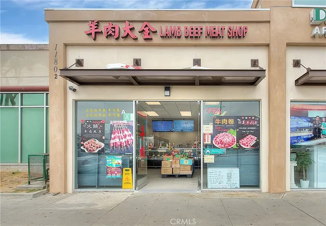 a front view of retail shop with outdoor space
