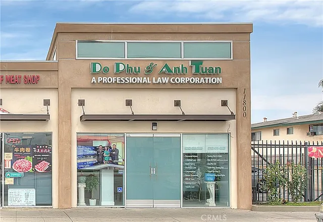 a front view of a building with basket ball court