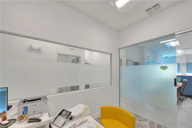 a bathroom with a sink a vanity and a mirror