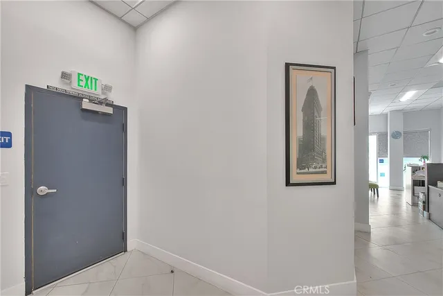 a view of cars parked in front of a building