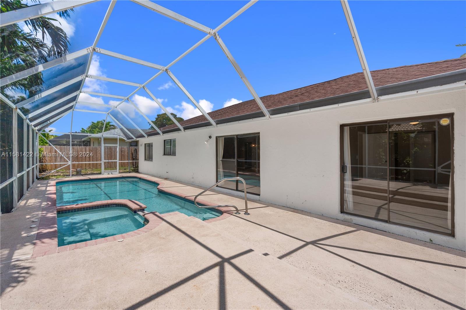 17689 Woodview Terrace Boca Raton, FL 33487 - Photo 14 of 15 a house view with a backyard space