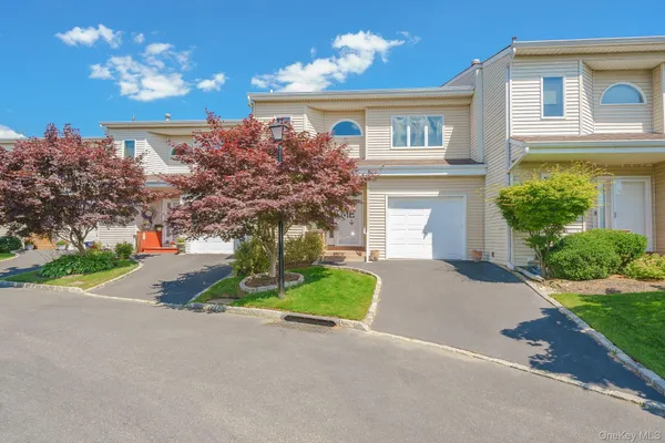$775,000 | 140 Atlantic Avenue, Unit 405, Oceanside, NY 11572