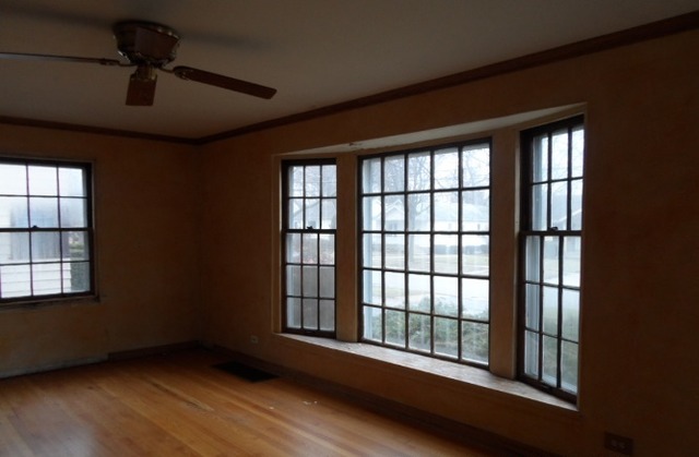 1446 Linden Road Homewood, IL 60430 - Photo 3 of 12 a view of an empty room with a window