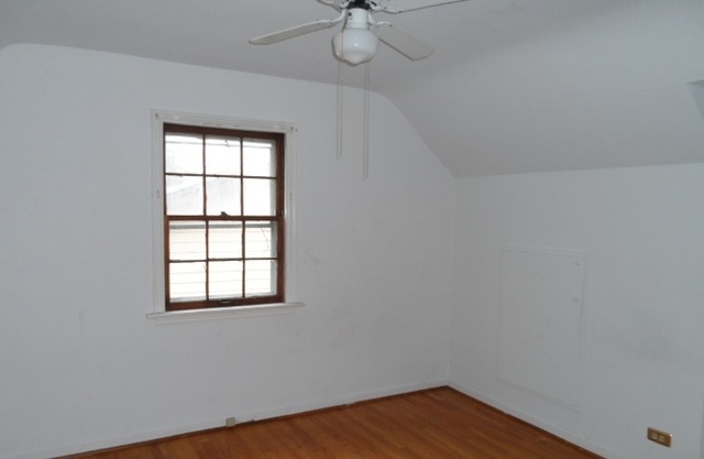 1446 Linden Road Homewood, IL 60430 - Photo 8 of 12 an empty room with a window