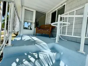 a view of a house with a yard and plants