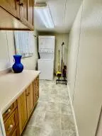 a front view of a house with garden and porch