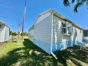 a view of a yard and a house