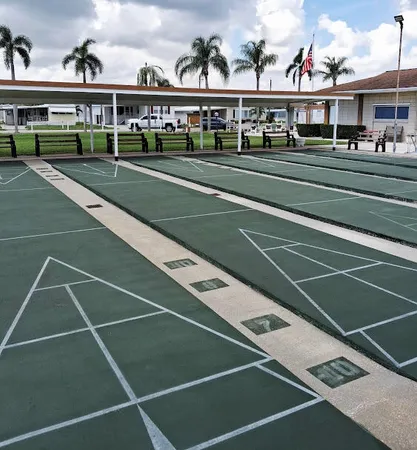 a view of a terrace with a table and chairs