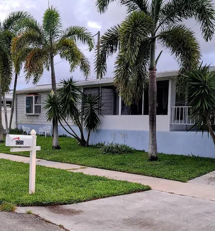 a view of a workspace with furniture
