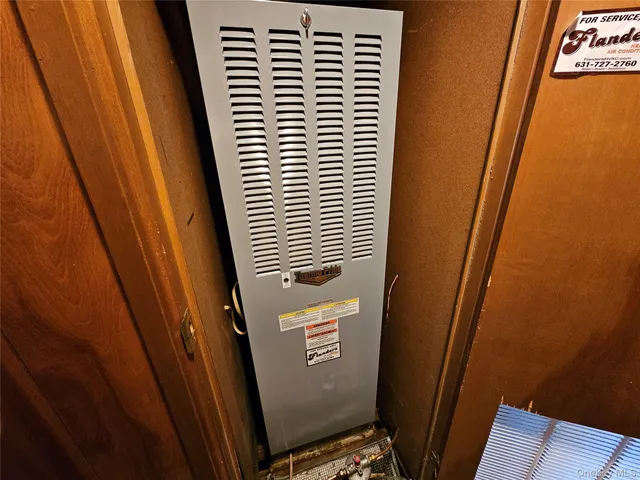 a bathroom with a sink a washer and dryer