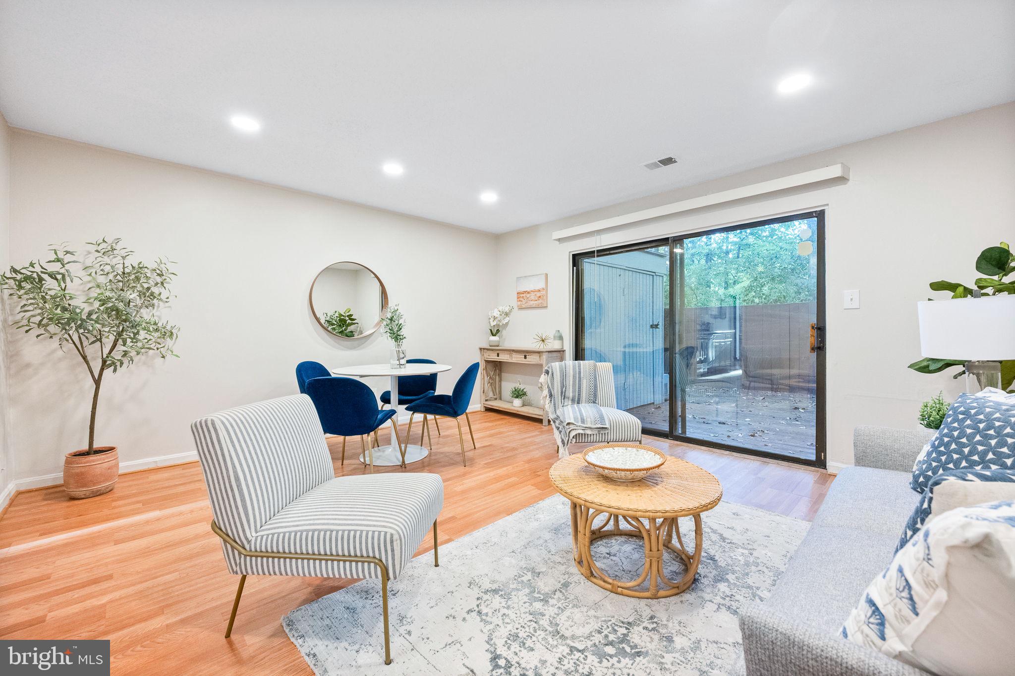 2340 Southgate Square Reston, VA 20191 - Photo 1 of 33 a living room with furniture and a large window