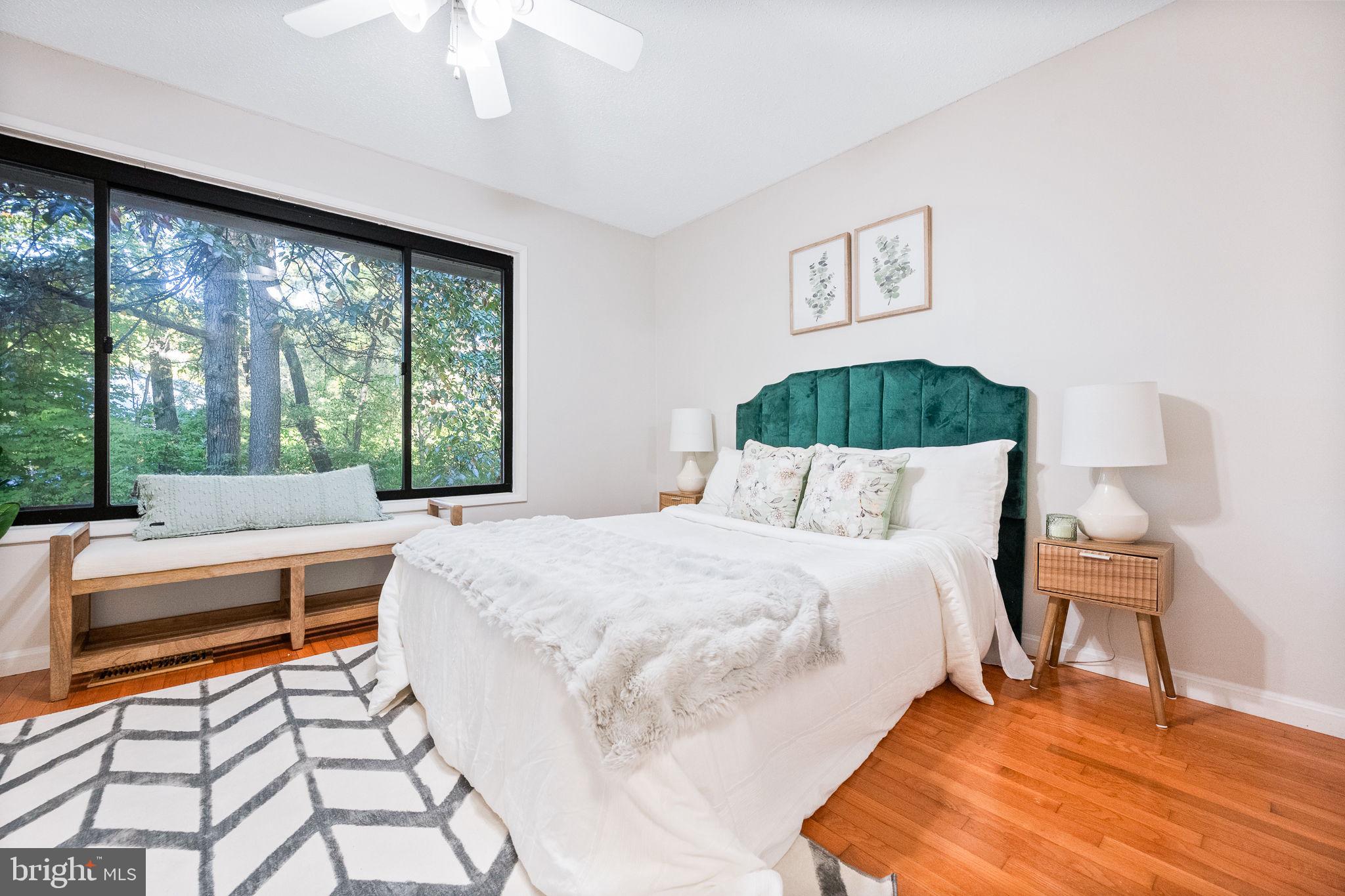 2340 Southgate Square Reston, VA 20191 - Photo 20 of 33 a bedroom with a bed and a large window