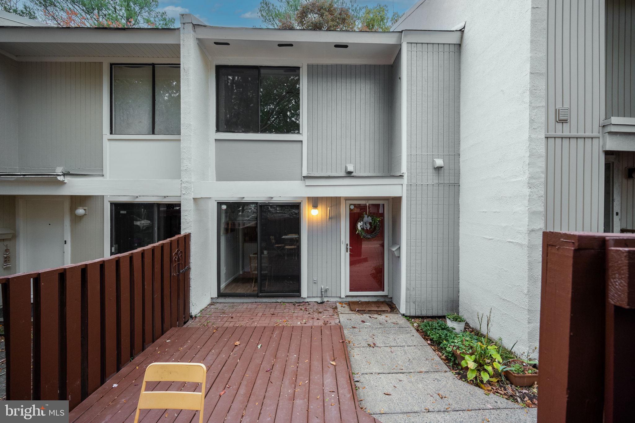 2340 Southgate Square Reston, VA 20191 - Photo 2 of 33 a view of a porch with wooden floor and stairs