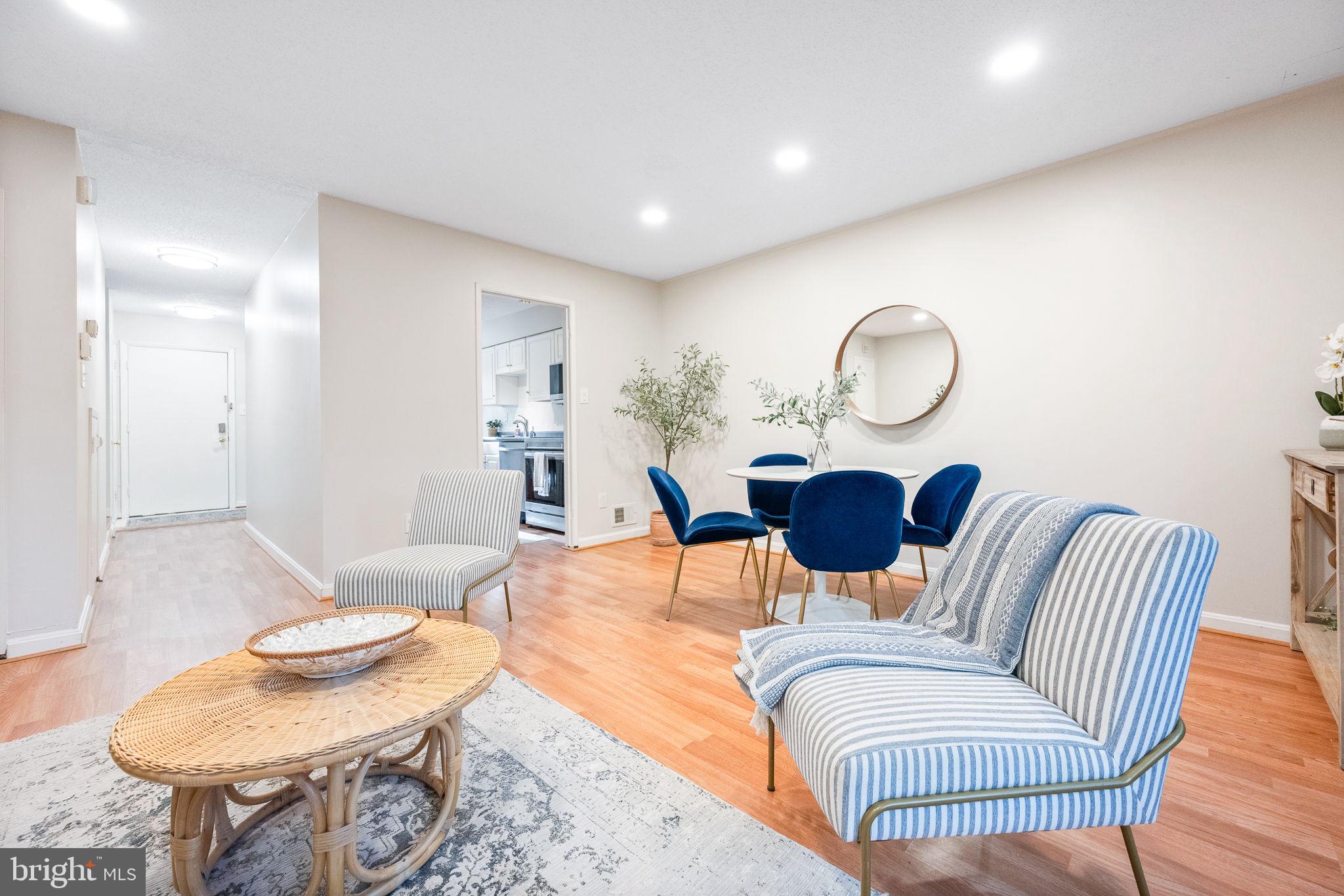 2340 Southgate Square Reston, VA 20191 - Photo 8 of 33 a living room with furniture a dining table and chair
