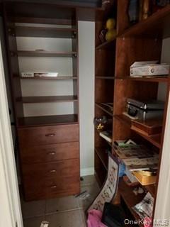 1117 Cedar Ridge Road Oyster Bay, NY 11771 - Photo 22 of 41 a refrigerator freezer sitting inside of a kitchen